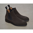 A Berwick 1707 dark brown suede Chelsea boot with a black elastic panel and a low heel, displayed on a white background.
