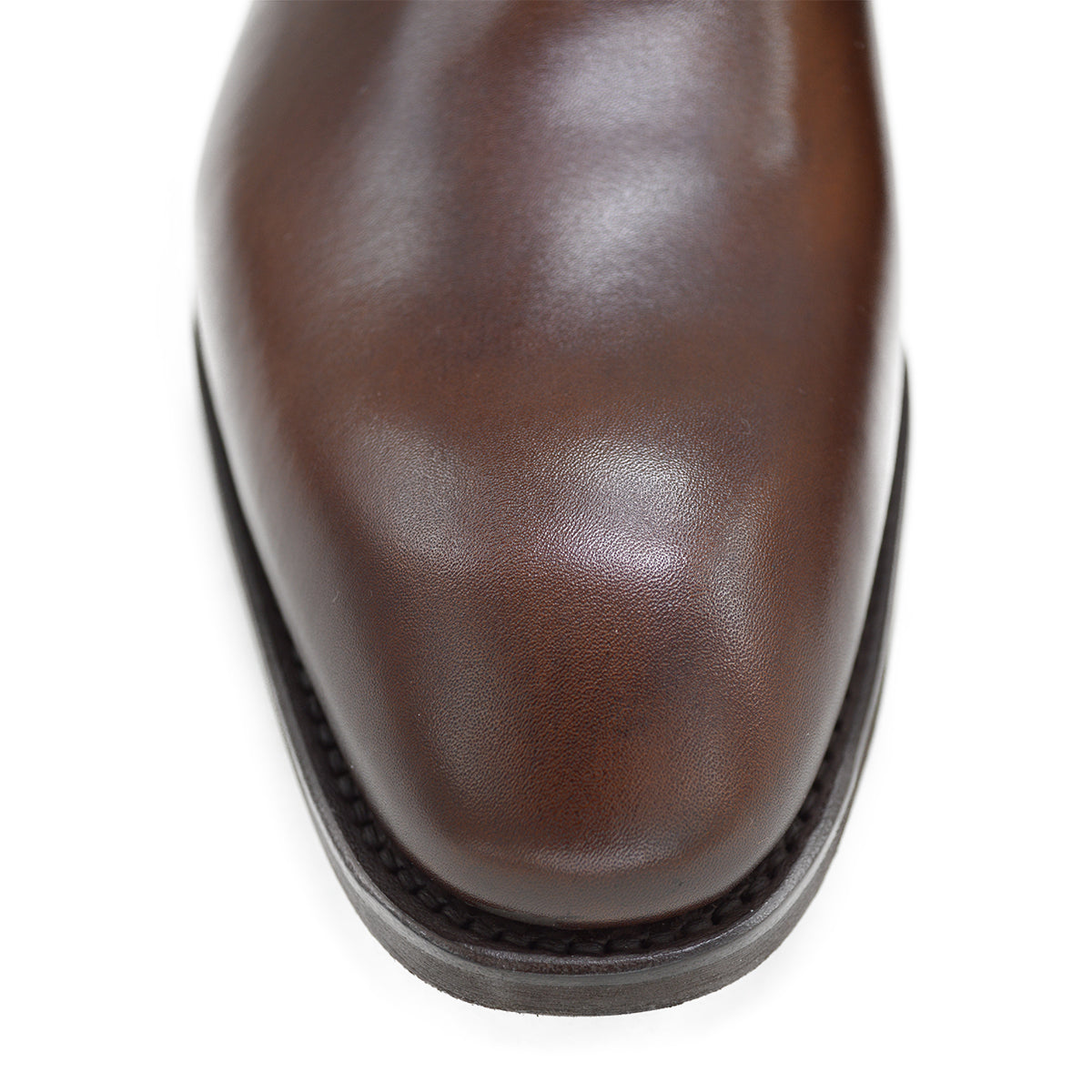 A Berwick 1707 brown leather wholecut oxford shoe with a lace-up closure and a round toe.