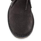 A brown Astorflex Montflex unlined boot with a lace-up closure, made from reverse suede, showcasing the natural rubber sole.