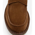 A brown Astorflex Sadelflex Loafer with soft suede upper and crepe rubber sole