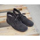 A brown Astorflex Montflex unlined boot with a lace-up closure, made from reverse suede, showcasing the natural rubber sole.
