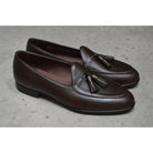 A Berwick 1707 dark brown deerskin Belgian loafer with a tassel detail on the vamp
