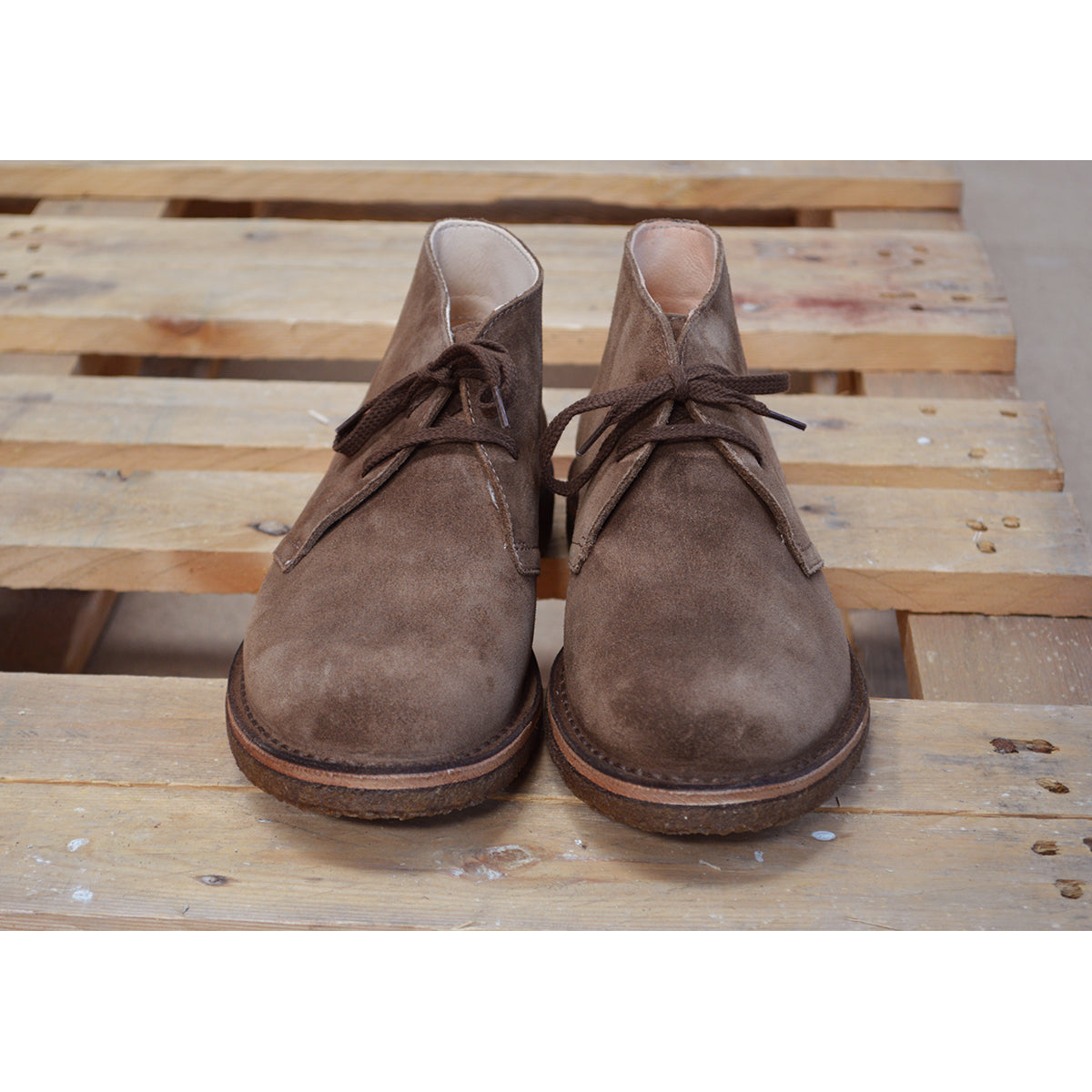 A brown suede Greenflex Desert Boot with a lace-up closure, designed by Astorflex.