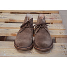 A brown suede Greenflex Desert Boot with a lace-up closure, designed by Astorflex.
