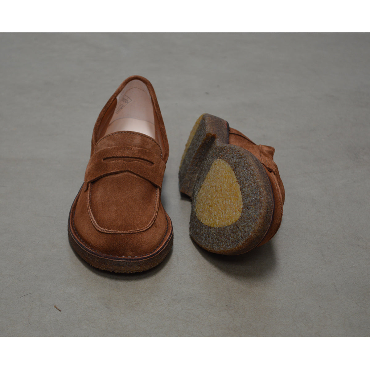 A brown Astorflex Sadelflex Loafer with soft suede upper and crepe rubber sole