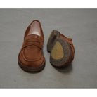 A brown Astorflex Sadelflex Loafer with soft suede upper and crepe rubber sole