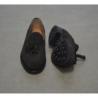 A classic dark brown suede slip-on shoe with tassels, by Berwick 1707, with a goodyear welted dainite sole.