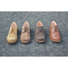 A range of brown Astorflex Redflex derby shoes made of suede & leather, featuring a natural crepe rubber sole.
