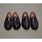 A Berwick 1707 dark brown &deerskin slip-on loafer with a tassel detail on the vamp & Dainite sole