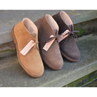 A brown suede Greenflex Desert Boot with a lace-up closure, designed by Astorflex.