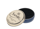 A tin of Saphir Medaille D'Or Mirror Gloss Wax Polish with the brand's logo and product name displayed on the lid.