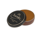 A round tin container of Saphir Medaille D'Or shoe wax polish with black lid and gold lettering.