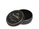 A round tin container of Saphir Medaille D'Or shoe wax polish with black lid and gold lettering.