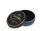 A round tin container of Saphir Medaille D'Or shoe wax polish with black lid and gold lettering.