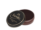A round tin container of Saphir Medaille D'Or shoe wax polish with black lid and gold lettering.