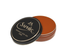 A round tin container of Saphir Medaille D'Or shoe wax polish with black lid and gold lettering.