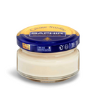 A jar of Saphir Creme Surfine shoe polish with a label on the lid.