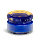 A jar of Saphir Creme Surfine shoe polish with a label on the lid.