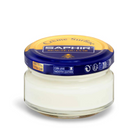 A jar of Saphir Creme Surfine shoe polish with a label on the lid.