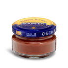 A jar of Saphir Creme Surfine shoe polish with a label on the lid.