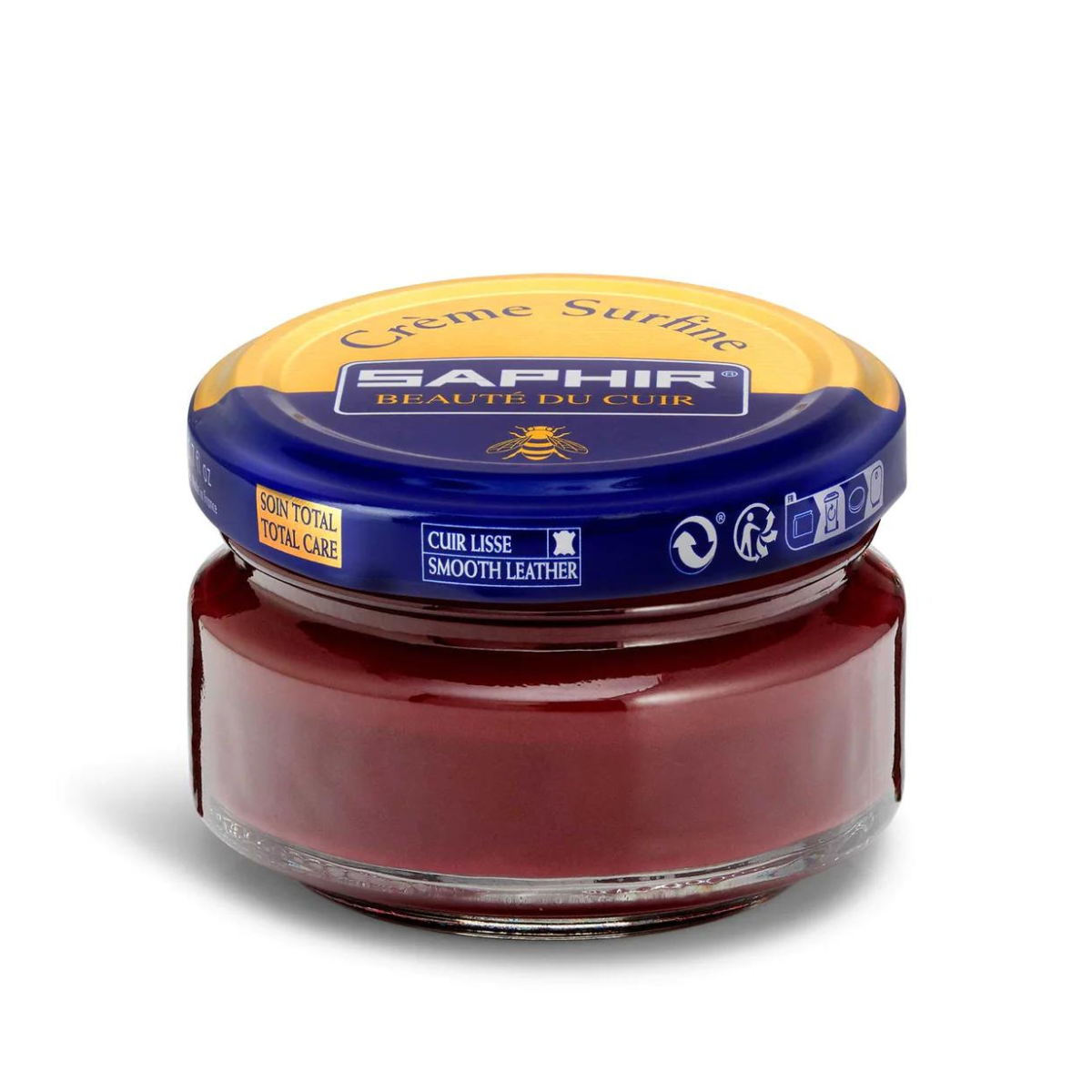 A jar of Saphir Creme Surfine shoe polish with a label on the lid.