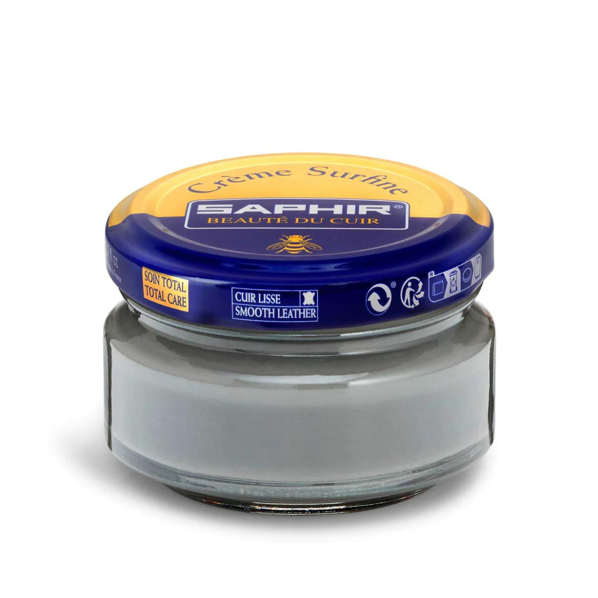 A jar of Saphir Creme Surfine shoe polish with a label on the lid.