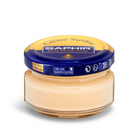 A jar of Saphir Creme Surfine shoe polish with a label on the lid.