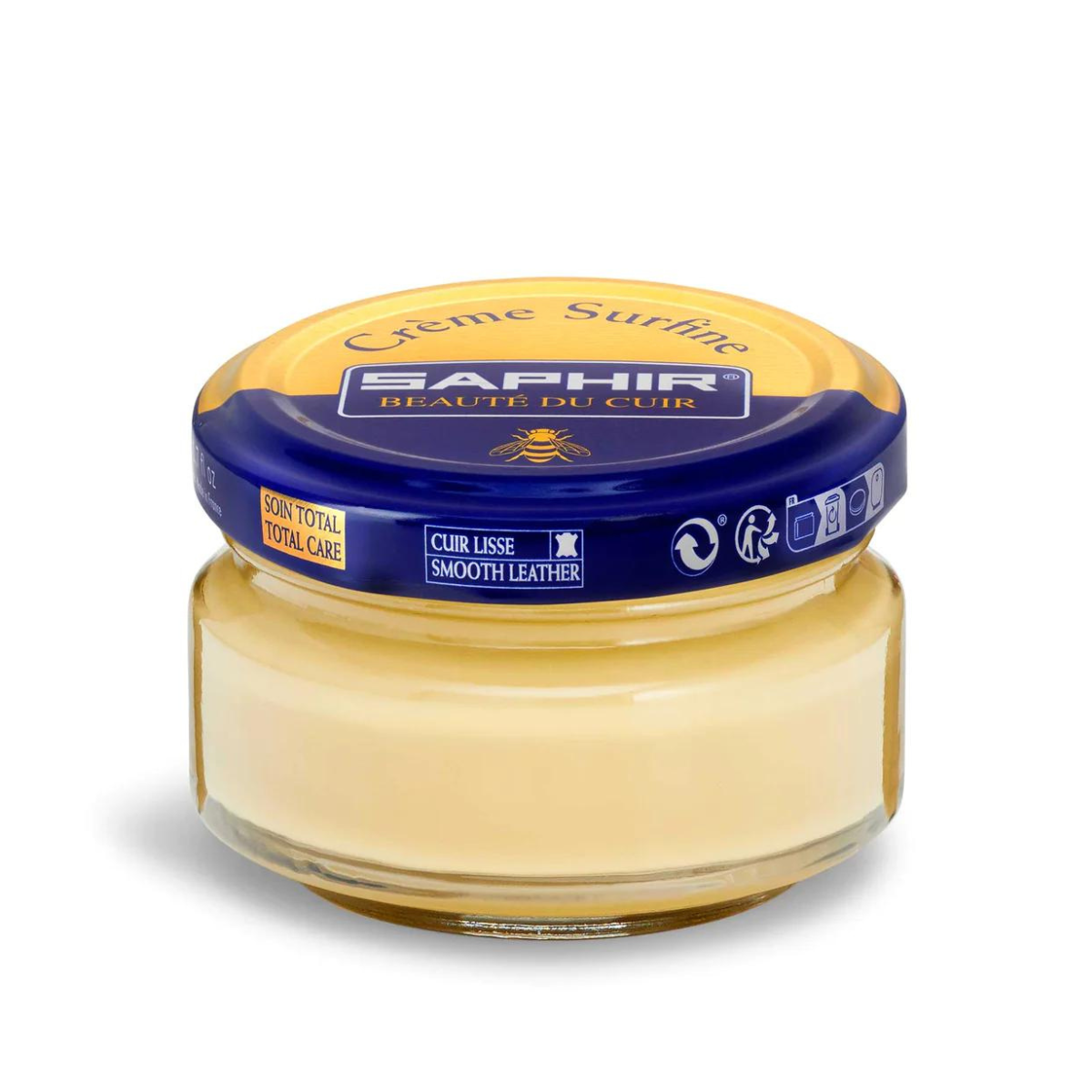 A jar of Saphir Creme Surfine shoe polish with a label on the lid.