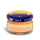 A jar of Saphir Creme Surfine shoe polish with a label on the lid.