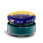 A jar of Saphir Creme Surfine shoe polish with a label on the lid.