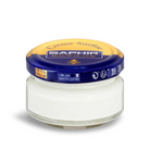 A jar of Saphir Creme Surfine shoe polish with a label on the lid.