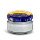 A jar of Saphir Creme Surfine shoe polish with a label on the lid.