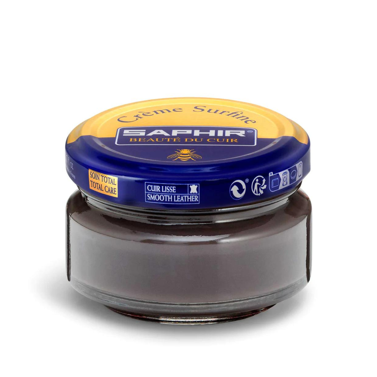 A jar of Saphir Creme Surfine shoe polish with a label on the lid.