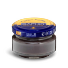 A jar of Saphir Creme Surfine shoe polish with a label on the lid.