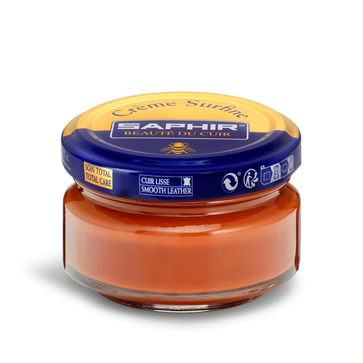 A jar of Saphir Creme Surfine shoe polish with a label on the lid.