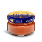 A jar of Saphir Creme Surfine shoe polish with a label on the lid.