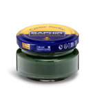 A jar of Saphir Creme Surfine shoe polish with a label on the lid.
