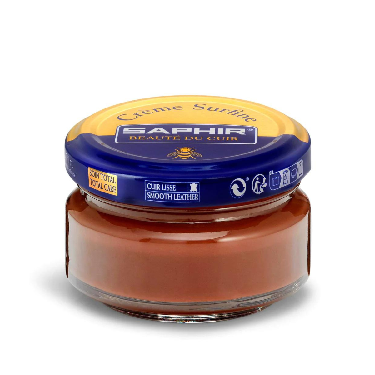 A jar of Saphir Creme Surfine shoe polish with a label on the lid.