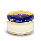 A jar of Saphir Creme Surfine shoe polish with a label on the lid.