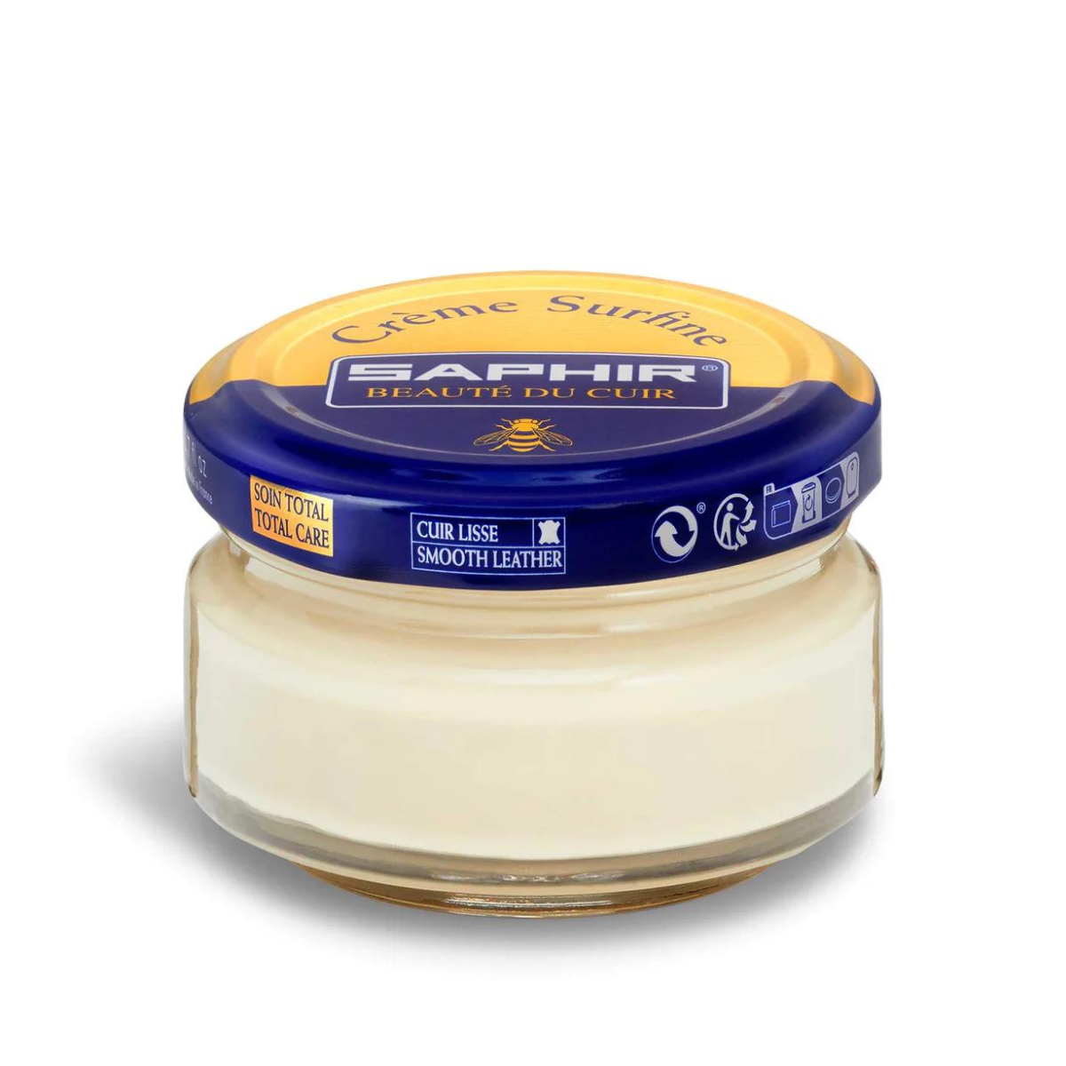 A jar of Saphir Creme Surfine shoe polish with a label on the lid.