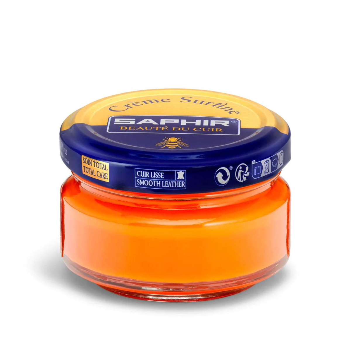 A jar of Saphir Creme Surfine shoe polish with a label on the lid.