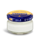 A jar of Saphir Creme Surfine shoe polish with a label on the lid.