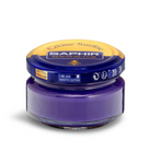A jar of Saphir Creme Surfine shoe polish with a label on the lid.