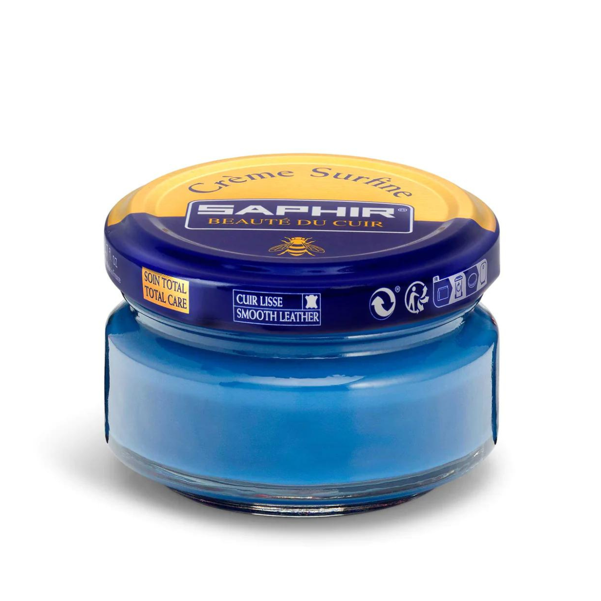 A jar of Saphir Creme Surfine shoe polish with a label on the lid.