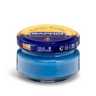 A jar of Saphir Creme Surfine shoe polish with a label on the lid.