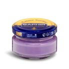 A jar of Saphir Creme Surfine shoe polish with a label on the lid.
