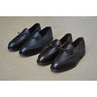 A Berwick 1707 classic black unlined laced slip-on loafer with a Goodyear welted leather sole.
