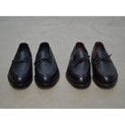 A Berwick 1707 classic black unlined laced slip-on loafer with a Goodyear welted leather sole.