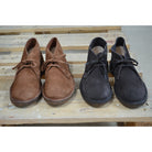 A brown Astorflex Montflex unlined boot with a lace-up closure, made from reverse suede, showcasing the natural rubber sole.