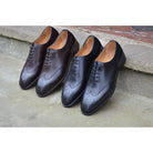 A Berwick 1707 moka brown wholecut Oxford brogue shoes with a goodyear welted leather sole, last week, and a smooth finish.